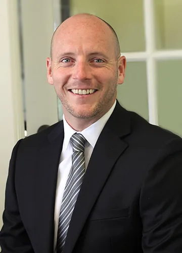 Portrait of Alex Manuel