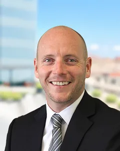 Portrait of Alex Manuel
